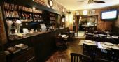 Artn Pizza oferece happy hour animada com variedades de pizza